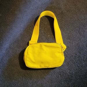 Neon bright yellow fanny pack from Amazon.